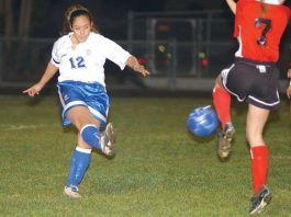 Lady Mustangs play one step behind Hollister