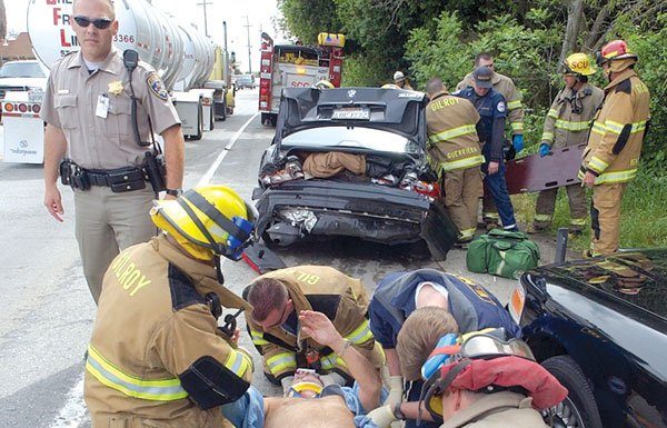 Three injured in two-car accident on Highway 152