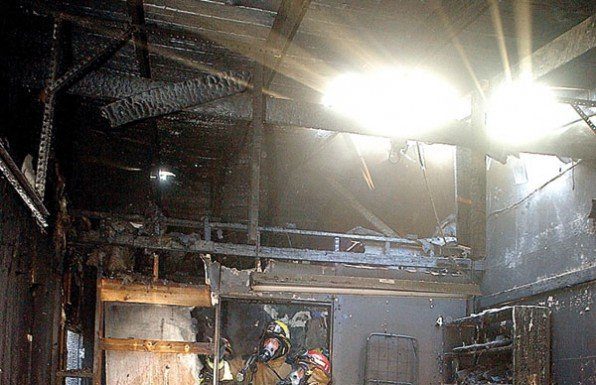 Garage fire displaces nine