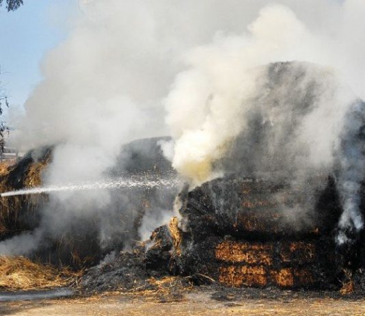 Straw Bales Burn, But Barn is Saved