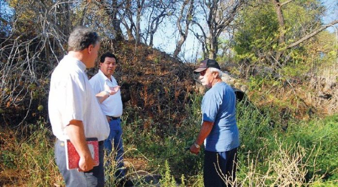 Environmental Officials Inspect Suspicious Pipes