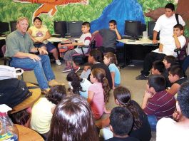 Former 49er brings smiles, $10K check to El Toro Youth Center