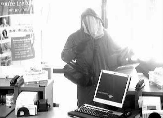 Photos released of bank robber