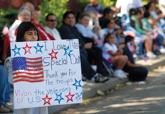Remembering service, honor: Parade brings out strong sense of community