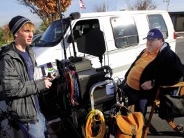 Students help on set of film