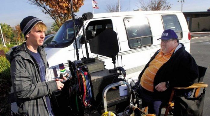 Students help on set of film