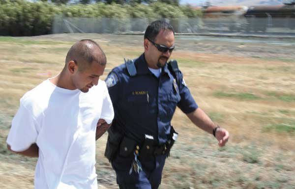 D.A. charges both sides with murder for gang slaying