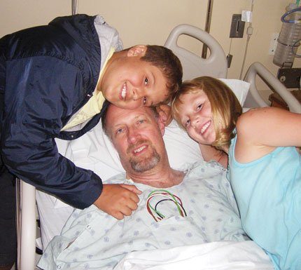 Son saves dad from icy waters