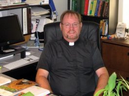 Priest returns to St. Catherine Church