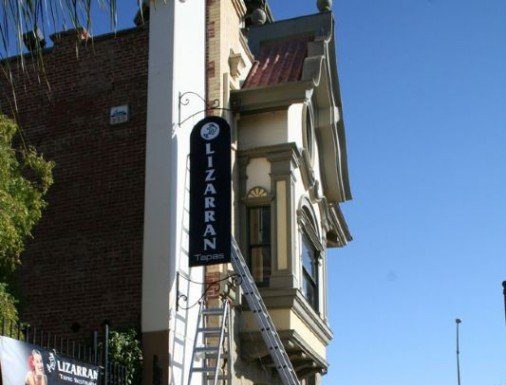 Temporary library to bump out auction house, gym near Third and Monterey