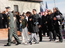 Funeral procession draws hundreds