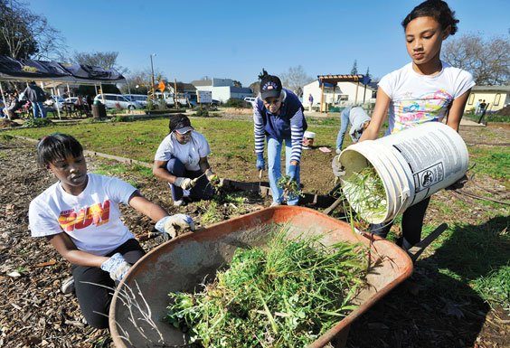 Gilroy volunteers dig MLK holiday