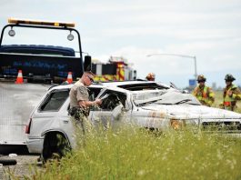 Woman receives minor injuries in rollover