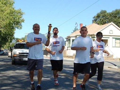 VIDEO: Officers, athletes run with Special Olympics torch