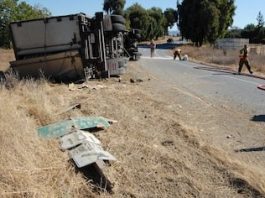 Semi overturns, shuts down Hwy. 101 on-ramp