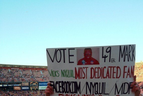 Red and gold through and through; local crowned ‘Most Dedicated Fan’