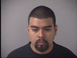 Police find pound of pot in occupied parked car