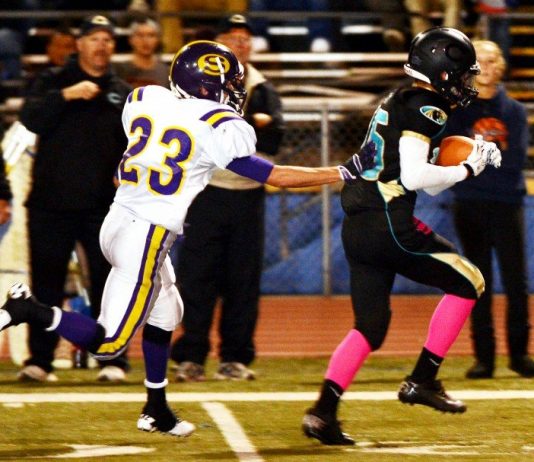 FOOTBALL: Cougars fall to Cowboys, 50-16