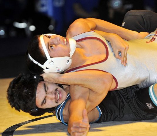 Wrestling: Christopher’s Lopez claims Mid-Cals title