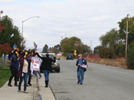 Community Solutions employees gather for rally