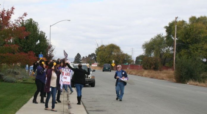Community Solutions employees gather for rally