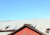 Bulldoze barn or bolster?