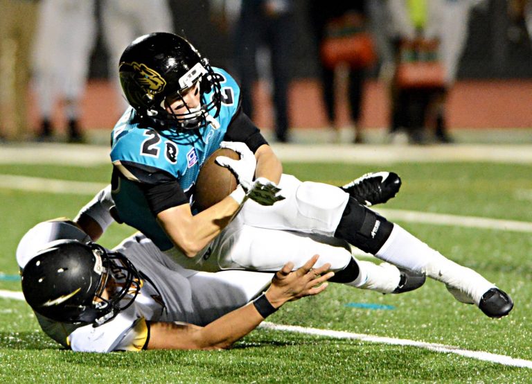 Prep Football: Cougars’ Sanford signs with Chapman