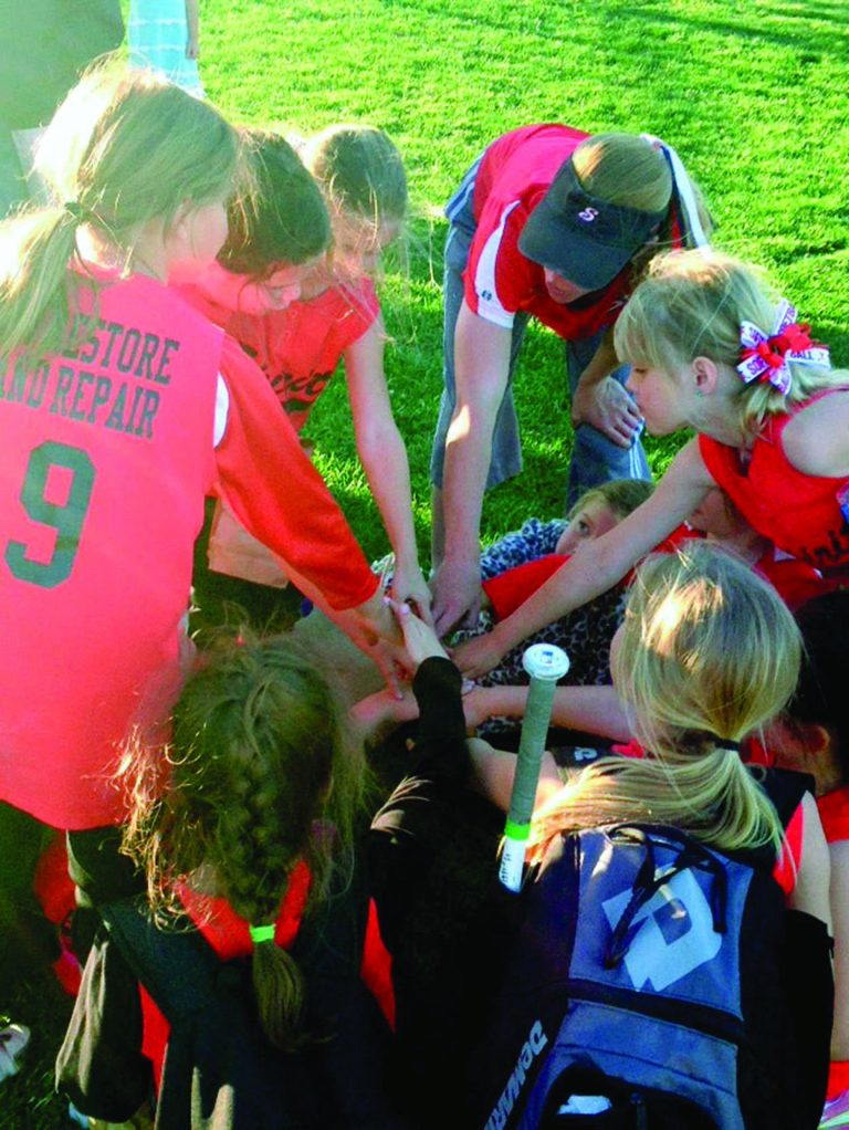 Coach shows spirit on, off fields