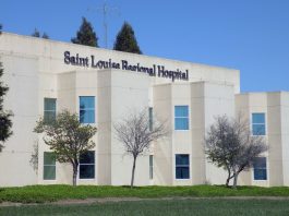 Prime sues attorney general over hospital sale