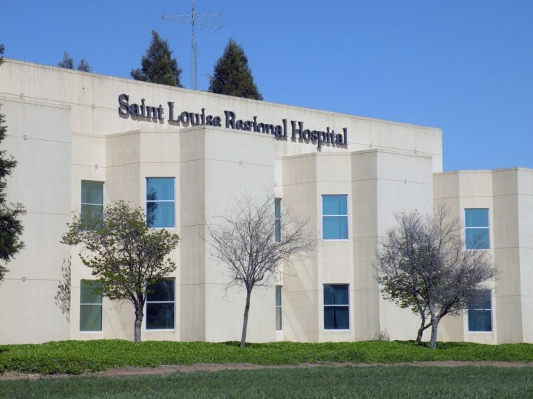 Prime sues attorney general over hospital sale