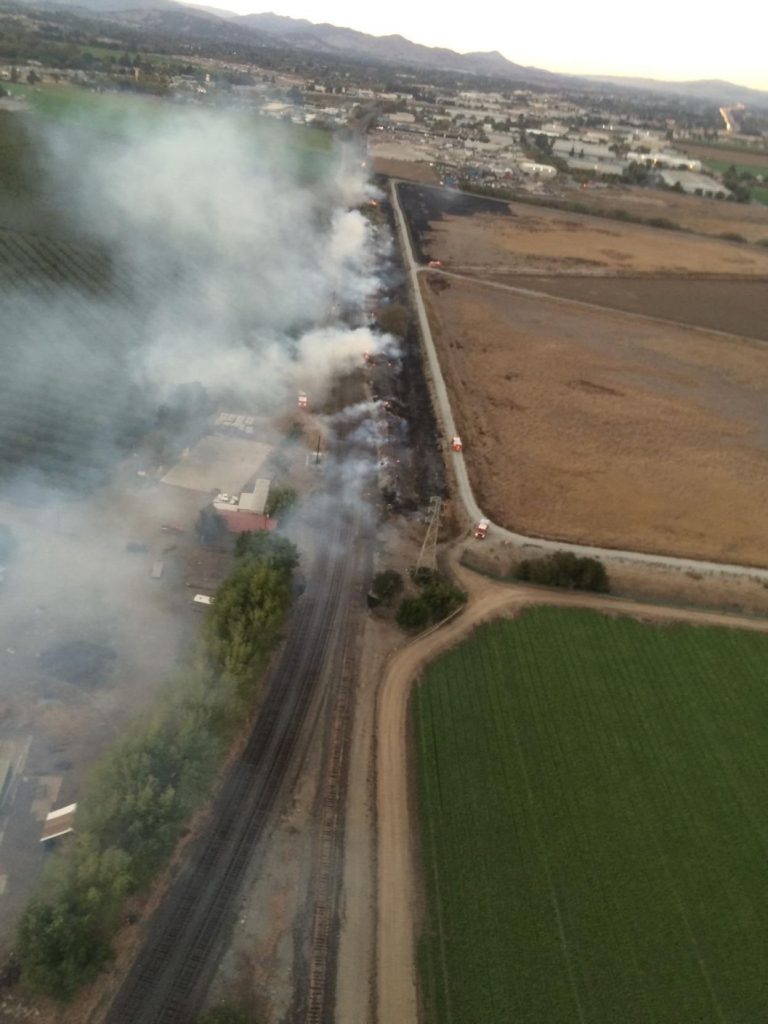 Grass fires spark near homeless encampment