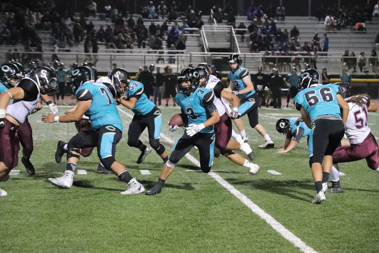 Second half push carries Christopher over Woodside