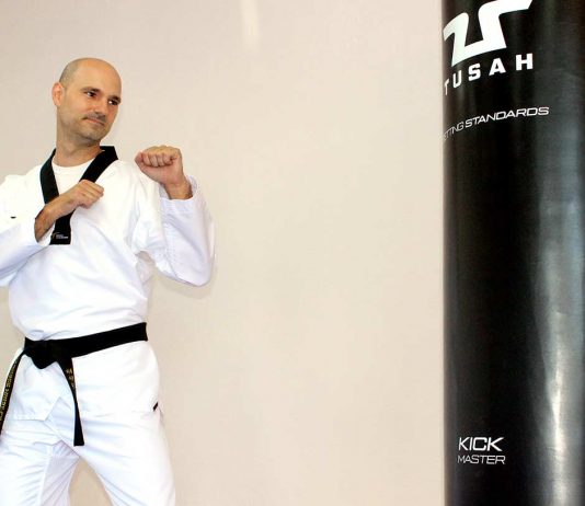 Taekwondo trainer fulfills his dreams