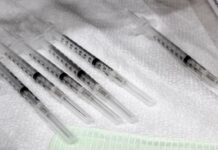 covid-19 vaccine syringe dose booster