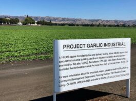 Delivery center moves forward camino arroyo highway 152 project garlic industrial amazon delivery center farmland agriculture