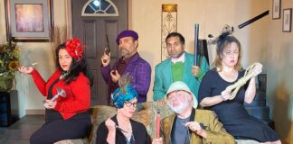 Pintello Comedy Theater clue onstage