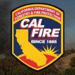 Image for display with article titled Vegetation fire burns near Redwood Retreat Road