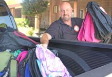 rotary club of gilroy community solutions backpack drive tony kranz