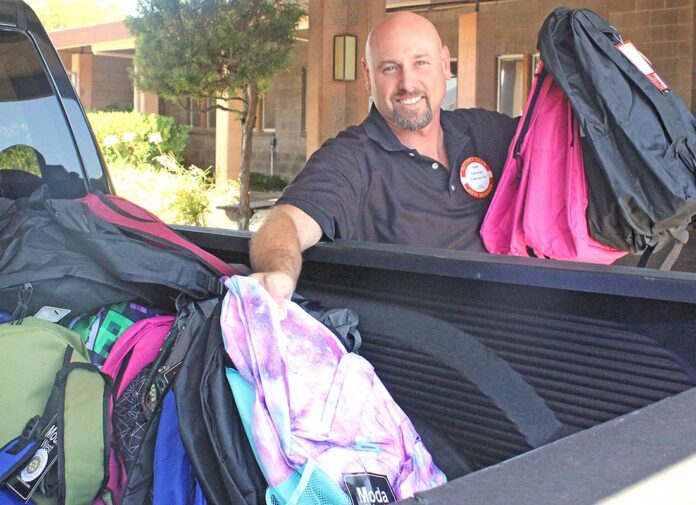 rotary club of gilroy community solutions backpack drive tony kranz