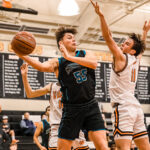 Image for display with article titled Despite graduating four starters, Christopher boys basketball develops and reloads for another potentially special season