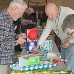 Image for display with article titled Photo: Gilroy Rotary clubs wrap donated gifts