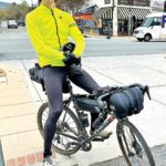 Image for display with article titled Man traveling Central Coast by bike visits Gilroy