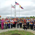 Image for display with article titled Local Scene: St. Louise hospital raises Pride flag; playground surface work begins