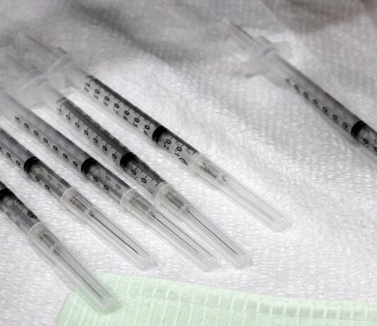 covid-19 vaccine syringe dose booster