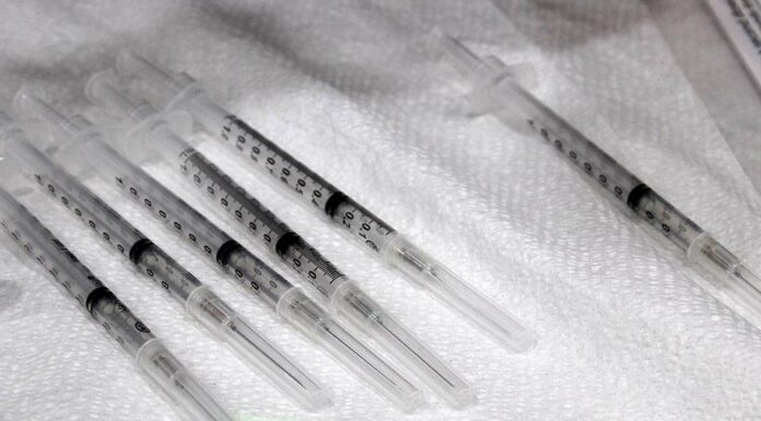 covid-19 vaccine syringe dose booster