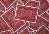 Following the Money: How Comparison Platforms Highlight the Best Payout Casinos Scattered red playing cards.