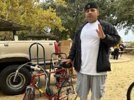 Jews, Muslims and Christians unite to distribute bikes, meals, hygiene kits
