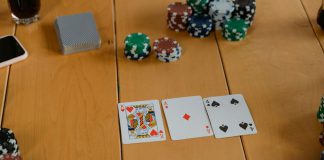 Playing cards on brown wooden table