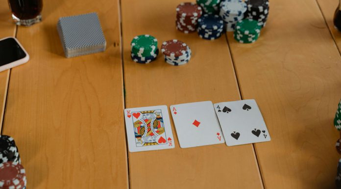 Playing cards on brown wooden table