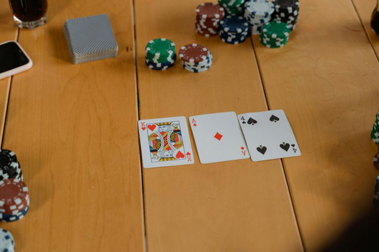Playing cards on brown wooden table